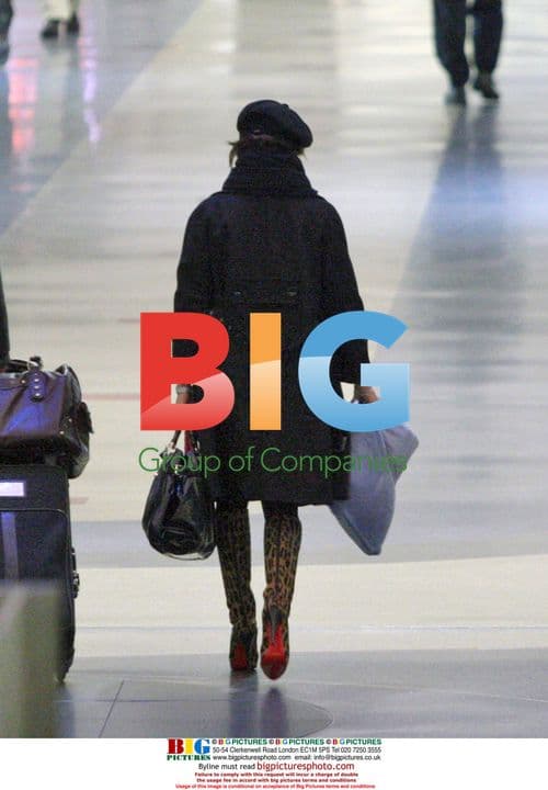 Eva Longoria Departs LAX in Style