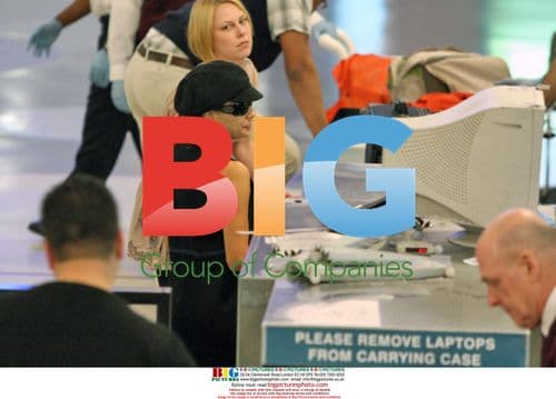 Eva Longoria departs LAX in chic travel style