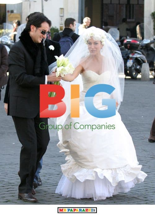 Nancy Dell'Olio Poses in Wedding Dresses in Rome