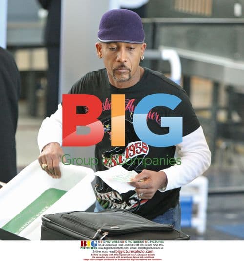 Montel Williams and wife Tara Fowler at LAX