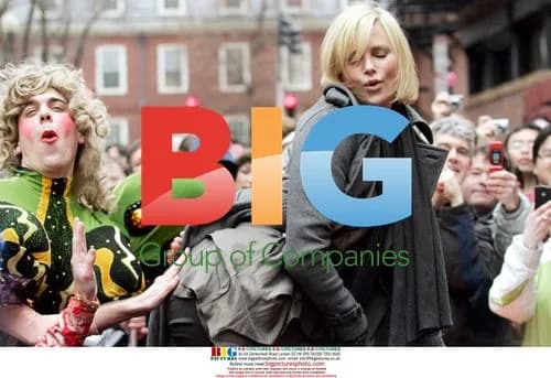 Charlize Theron receives award at Hasty Pudding parade