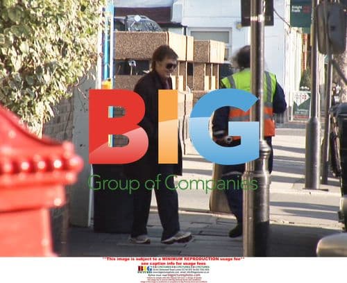 Paul McCartney Grabs Photographer's Camera