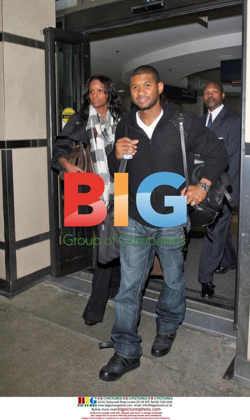 Usher Raymond and Tameka Foster Arrive in LA
