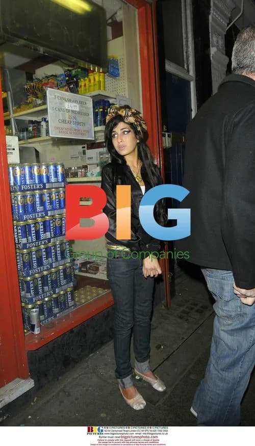 Healthier-looking Amy Winehouse in Soho