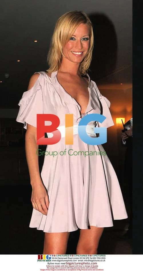 Denise Van Outen leaves London hotel with flowers