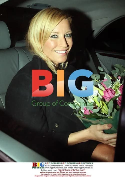 Denise Van Outen leaves hotel with flowers