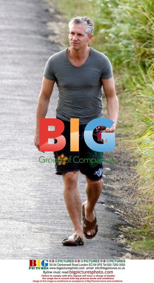 Gary Lineker walks alone in Caribbean