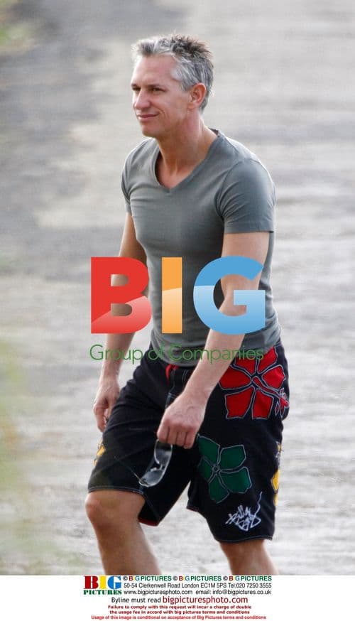 Gary Lineker walks alone in Caribbean