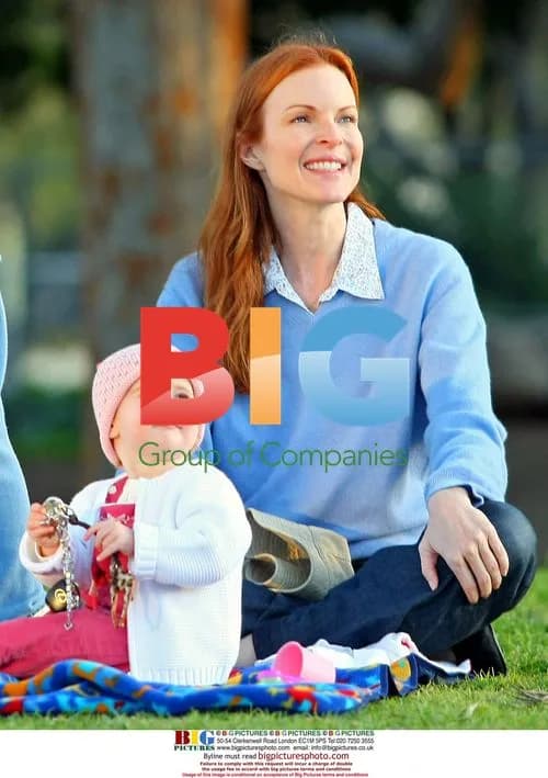 Marcia Cross takes twins to park