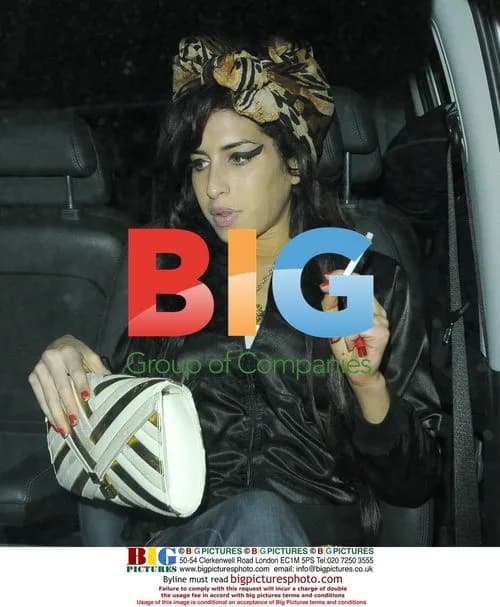 Amy Winehouse Visits Soho Friends