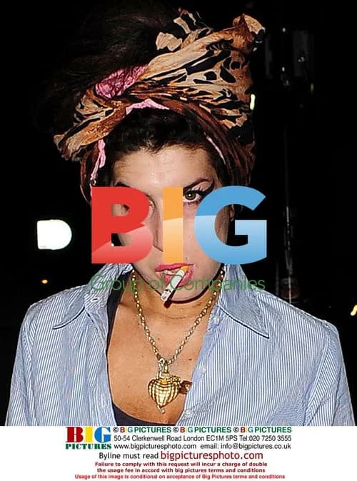Amy Winehouse gets out of car in London