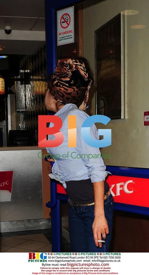 Amy Winehouse seeks security during KFC run