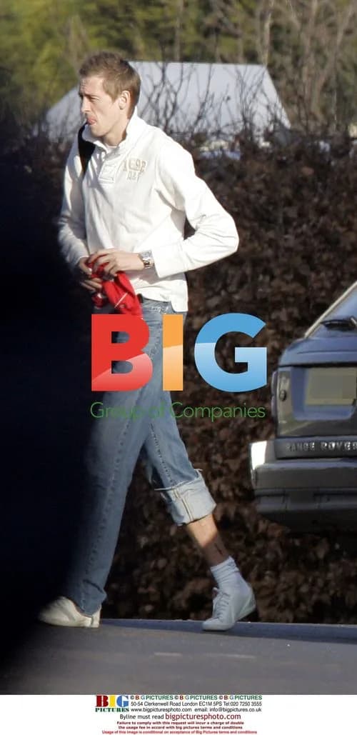Peter Crouch and Abbey Clancy arrive at Liverpool's training ground