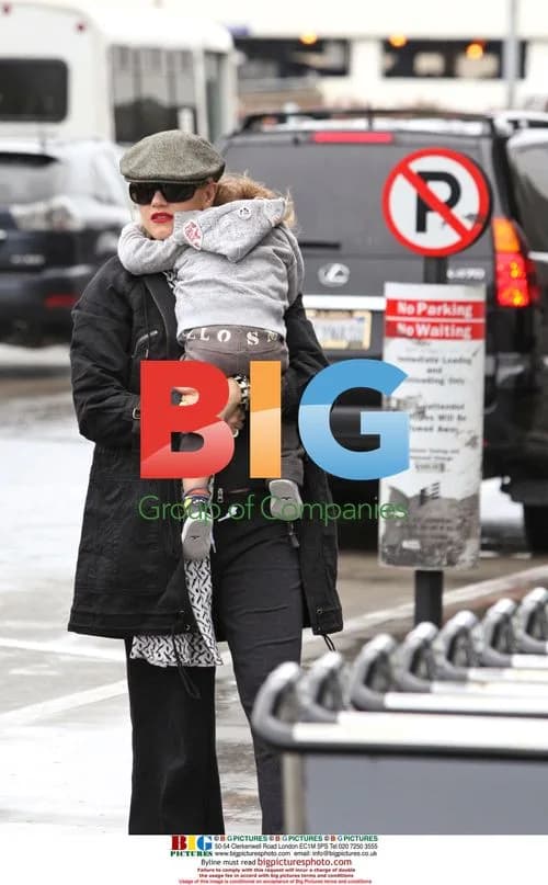 Gwen Stefani departs LAX with family