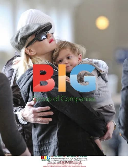 Gwen Stefani Departs LAX with Son