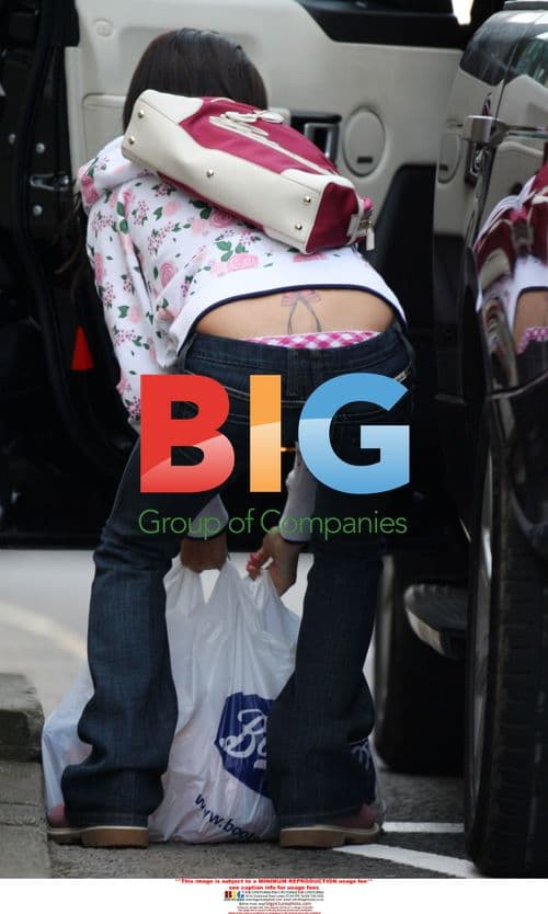 Katie Price Leaves Boots in UK