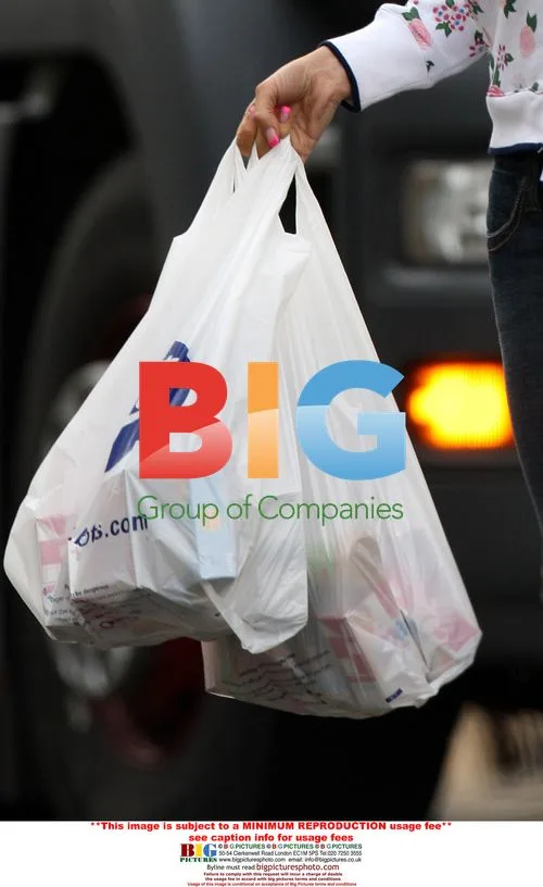 Katie Price Leaves Boots in Fatigue