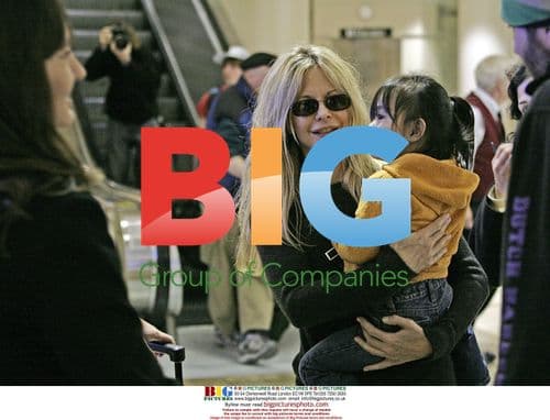 Meg Ryan arrives at LAX with kids