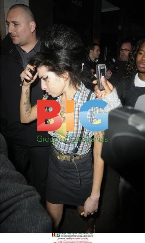 Amy Winehouse steps out after show