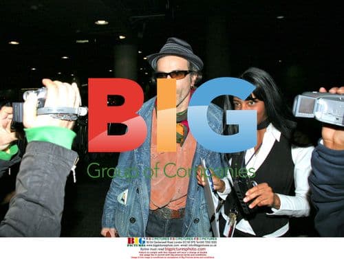 Daniel Day Lewis Arrives at LAX