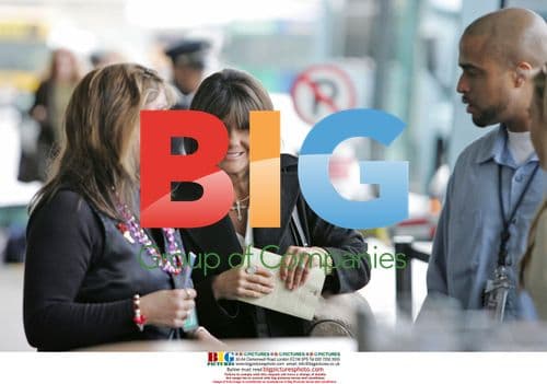 Lynn Spears Hides Behind Book at LAX