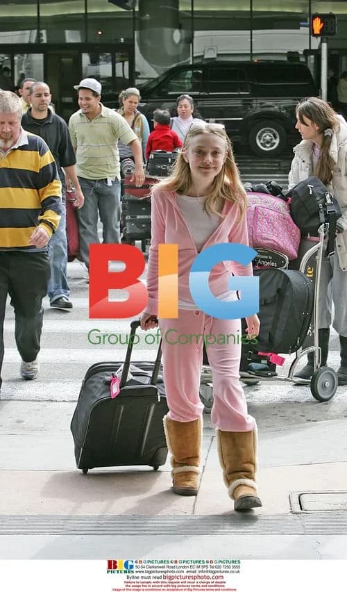 Dakota Fanning Arrives at LAX