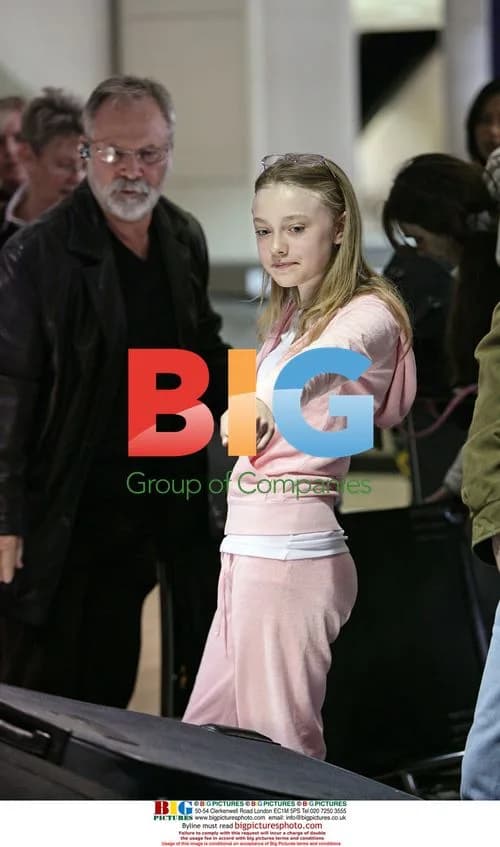 Dakota Fanning Arriving at LAX