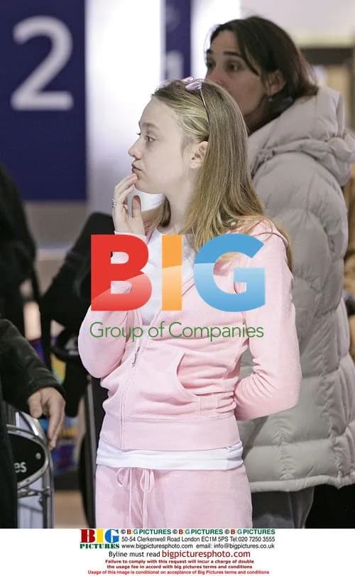 Dakota Fanning Arrives at LAX for 14th Birthday