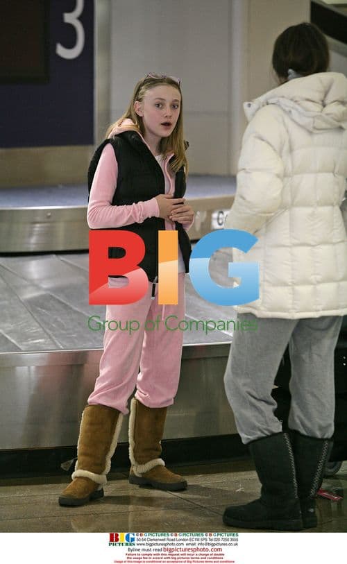 Dakota Fanning lands at LAX before 14th birthday
