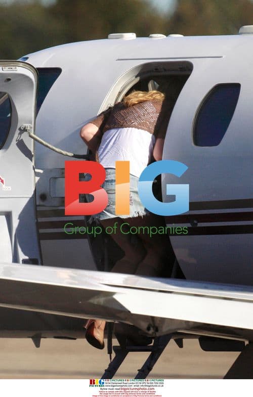 Rod Stewart and Penny Lancaster at private jet