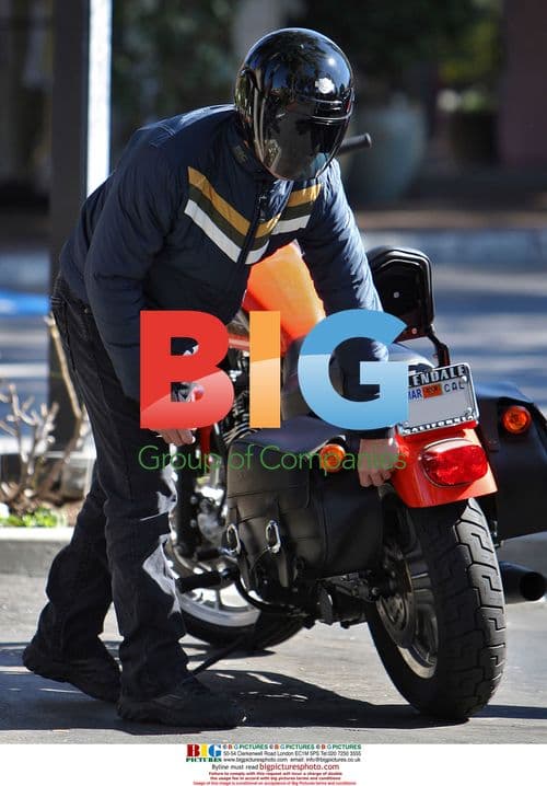 George Eads and girlfriend ride motorcycle