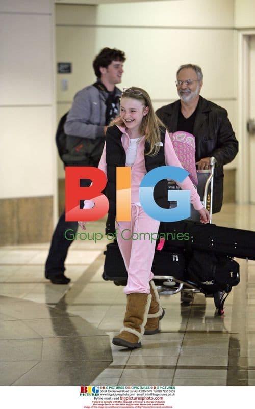 Dakota Fanning Arrives at LAX Before 14th Birthday