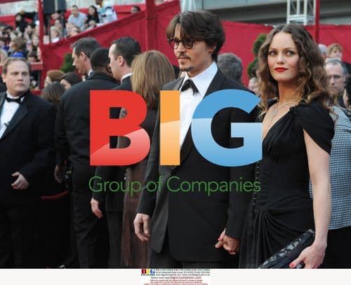 Johnny Depp and Vanessa Paradis at the 80th Oscars