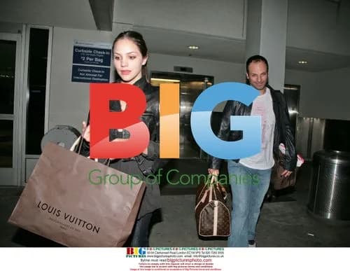 Newlyweds Katharine McPhee and Nick Cokas Arrive at LAX