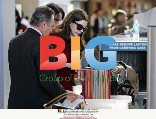 Anne Hathaway and boyfriend at LAX