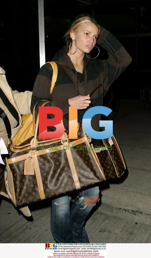 Jessica Simpson Arrives at JFK