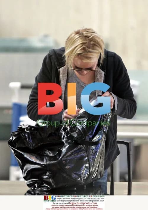 Renee Zellweger Departs LAX with Large Bag