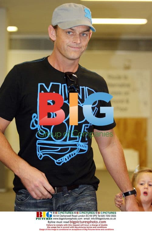 Adam Gilchrist Arrives at Perth Airport