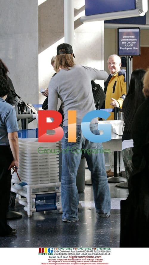 Josh Halloway and wife depart LAX