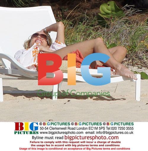 Nicollette Sherdian and Michael Bolton on St Barts beach