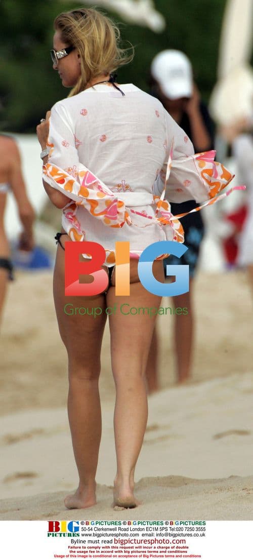 Nicollette Sherdian and Michael Bolton on Flamands beach in St Barts