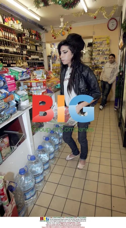 Amy Winehouse Seen Shopping After Prison Visit