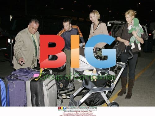 Jenna Elfman Departs LAX with Family