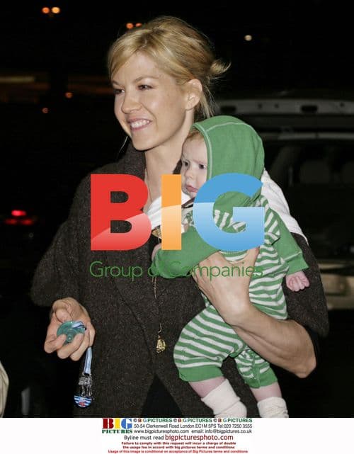 Jenna Elfman departs LAX with family