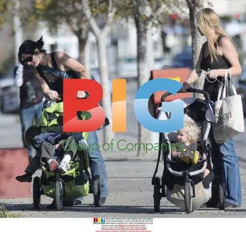 Carrie Anne Moss and Best Friend Out with Kids