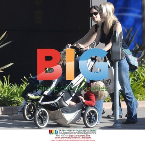 Carrie Anne Moss and Friend Take Kids on Stroll