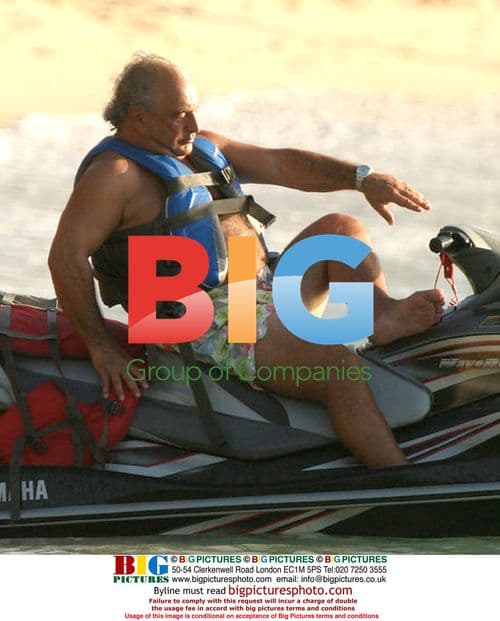 Simon Cowell with Philip Green on Jet Ski in Barbados