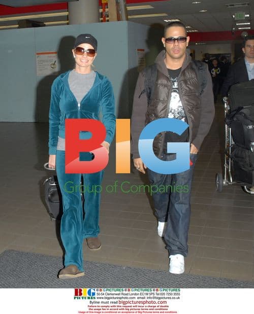 Jamie Pressly and Eric Calvo at LAX