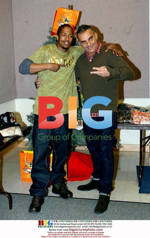 Nick Cannon and Christian Audigier Give to Kids