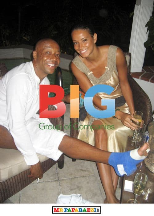 Russell Simmons with broken foot at party